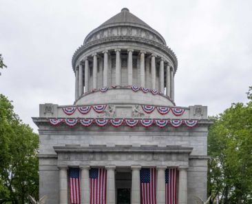 Front exterior of General Grant National Memorial, Grant's Tomb surrounded by trees in Riverside Park, New York City