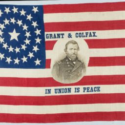 u.s. flag with portrait of General Ulysses S. Grant and the words "Grant & Colfax. In union is peace."